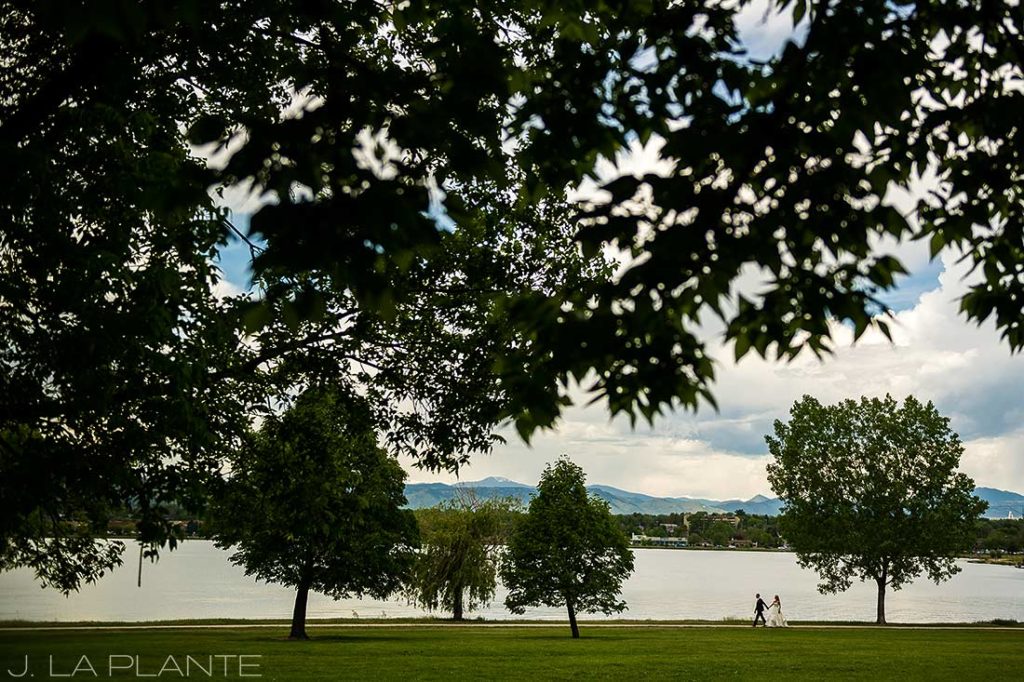 J. La Plante Photo | Denver Wedding Photographer | Sloan's Lake Park Wedding | Bride and Groom Walking by Lake