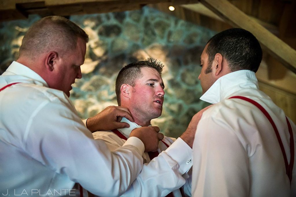 J. La Plante Photo | Winter Park Colorado Wedding Photographer | Devil's Thumb Ranch Wedding | Funny Photo of Groomsmen Getting Ready