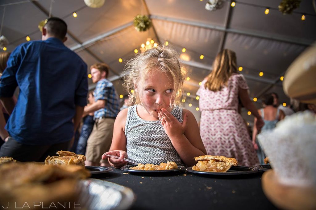 J. LaPlante Photo | Colorado Wedding Photographers | Mon Cheri Wedding | Flower Girl Sneaking Cake