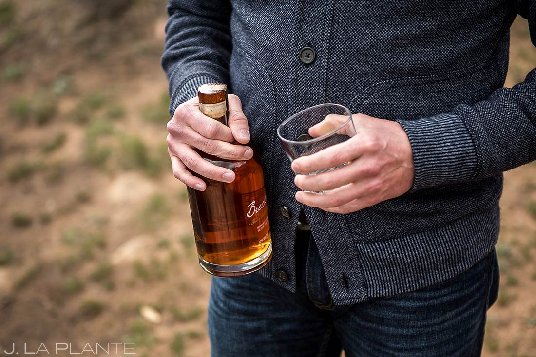 Groom Drinking Bourbon | Estes Park Wedding Photographer | J. La Plante Photo