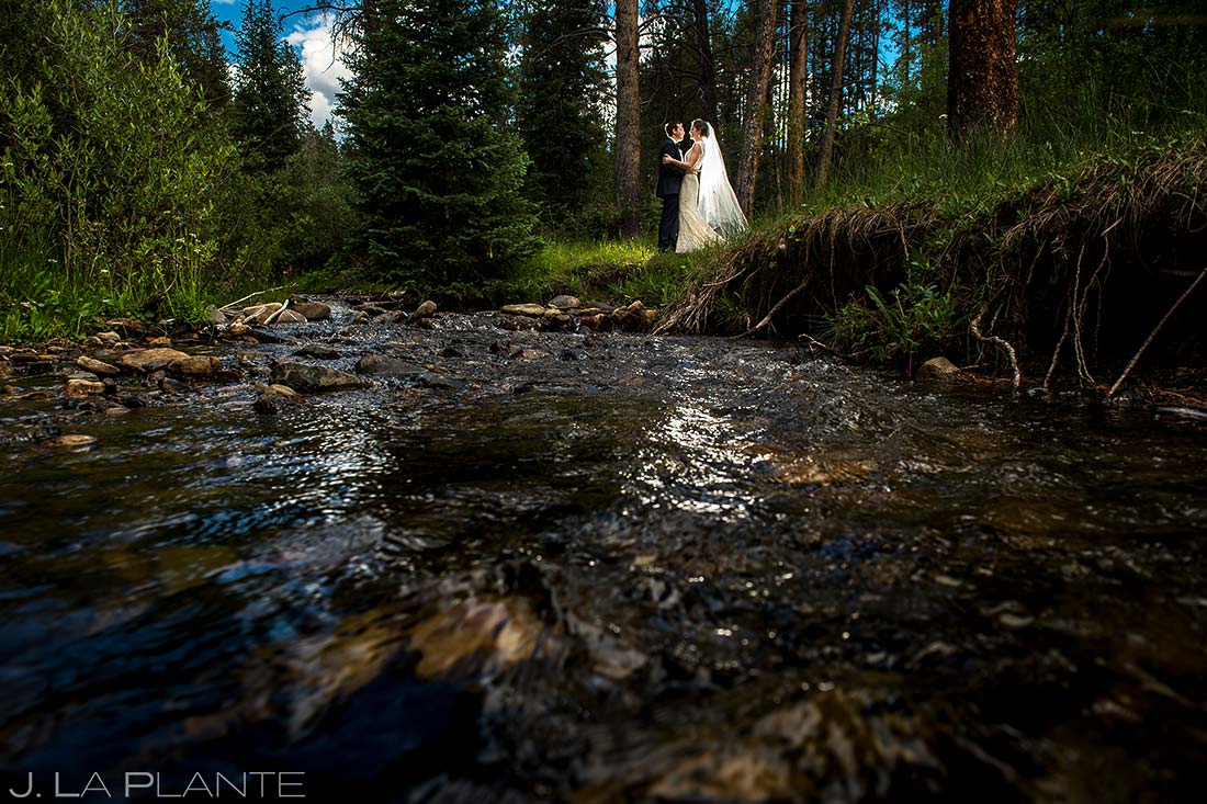Bride and Groom Portrait by River | Camp Hale Wedding | Vail Wedding Photographer | J. La Plante Photo