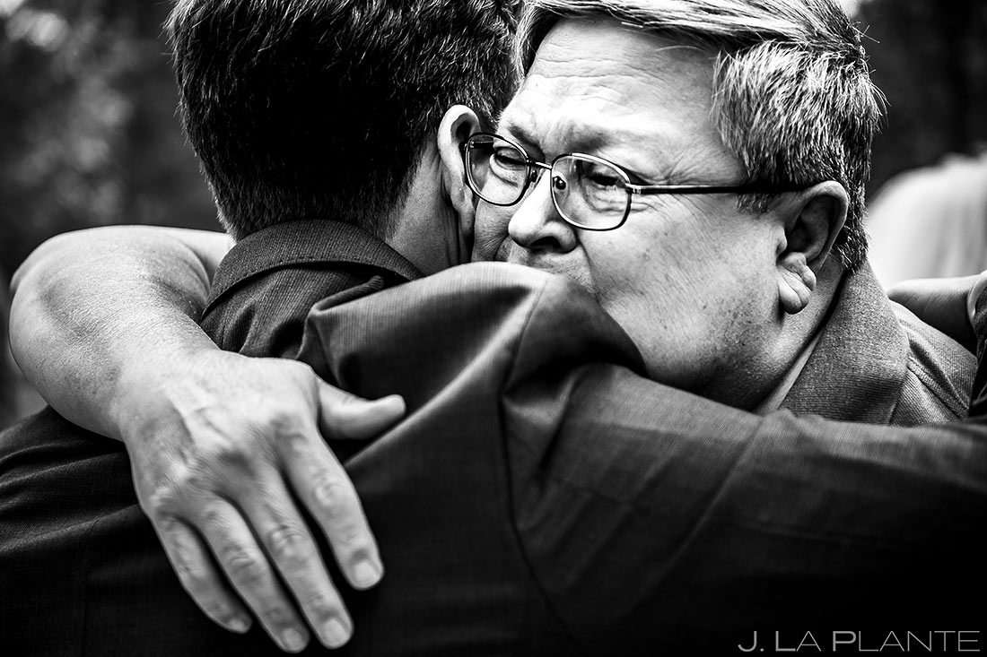 Groom Hugging Father | Lodge at Cathedral Pines Wedding | Colorado Springs Wedding Photographer | J. La Plante Photo