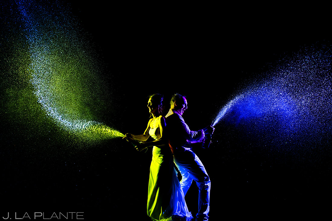 Bride and Groom Spraying Champagne | Chautauqua Park Wedding | Boulder Wedding Photographer | J. La Plante Photo