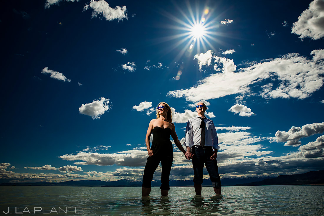 Bride and Groom Wading in Water | Bonneville Salt Flats Engagement | Destination Wedding Photographer | J. La Plante Photo