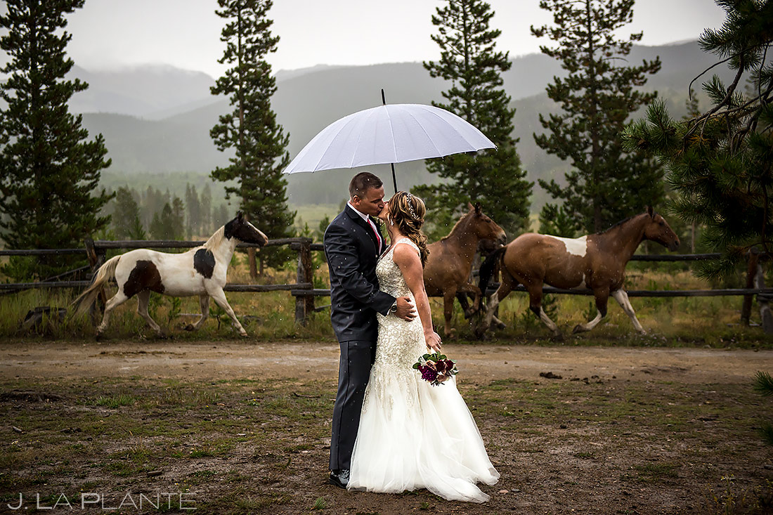 Bride and Groom with Horses | Devil's Thumb Wedding | Colorado Wedding Photographer | J. La Plante Photo