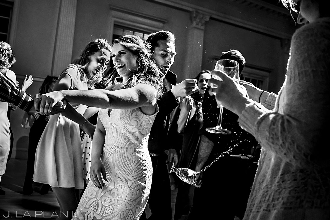 Stanley Hotel wedding guest dropping glass on the dance floor