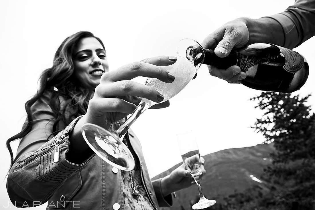 bride drinking a glass of Dom Pérignon