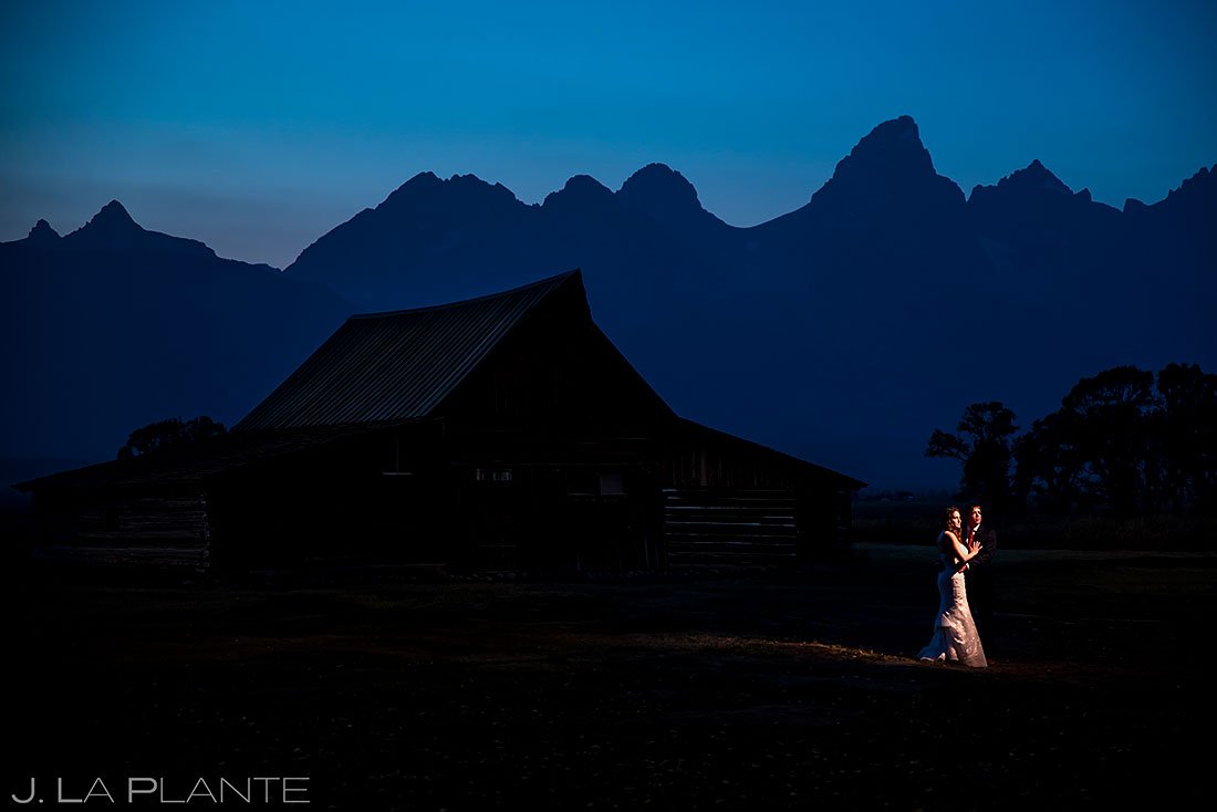 bride and groom at barn in jackson hole