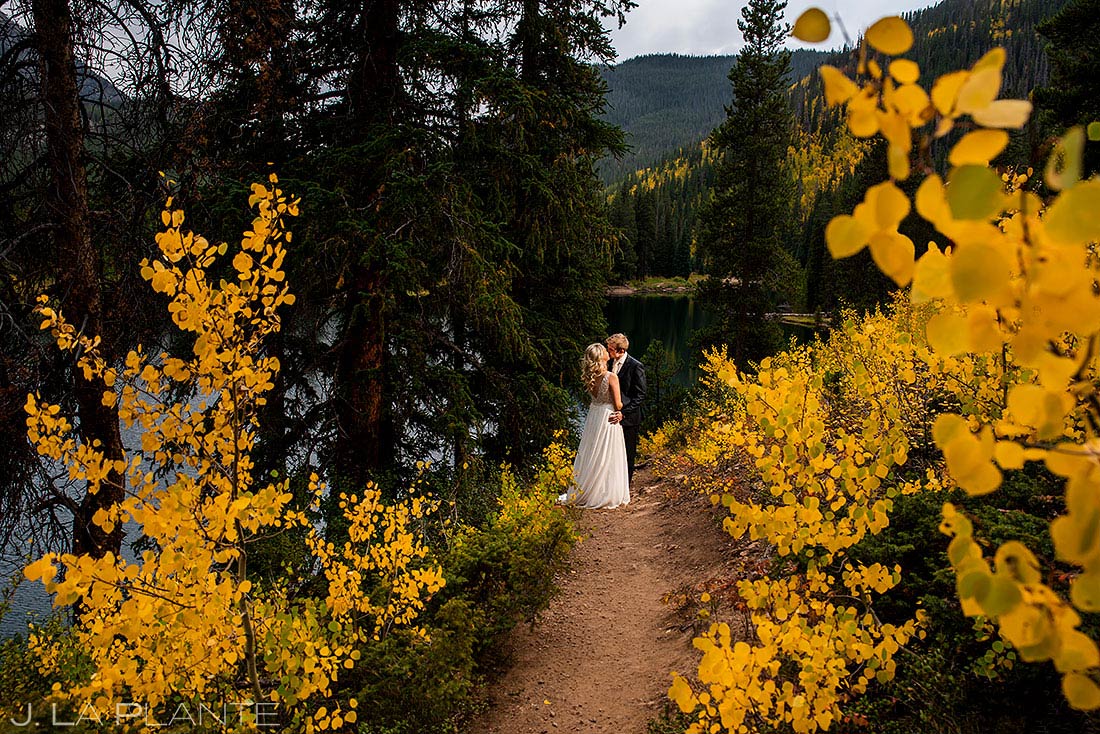 fall wedding near vail bride and groom with aspen trees