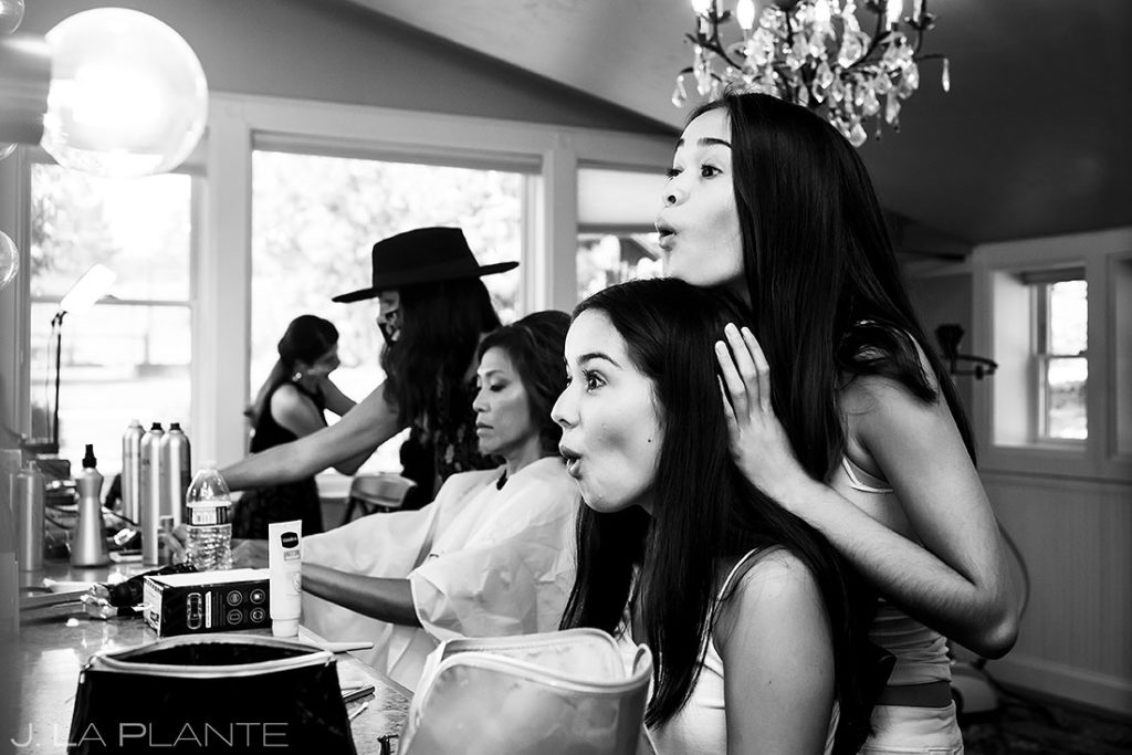 daughters of the bride getting ready before ceremony