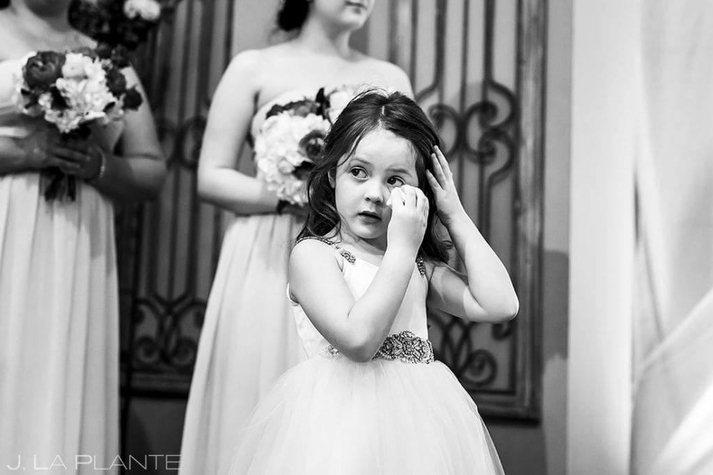 flower girl crying during wedding ceremony