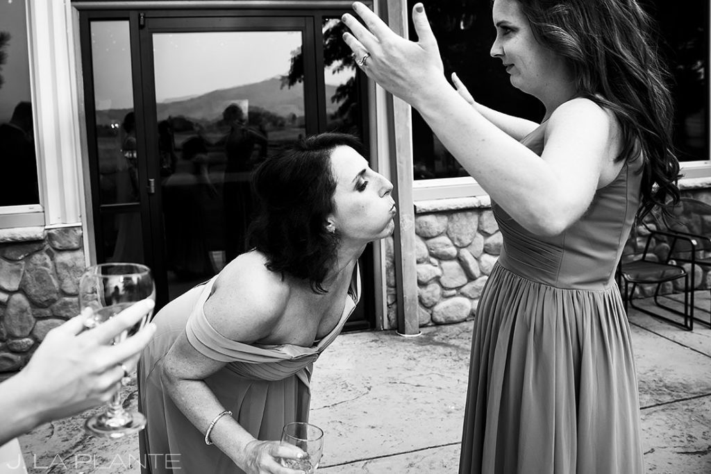 bridesmaids goofing around during summer wedding at Shupe Homestead