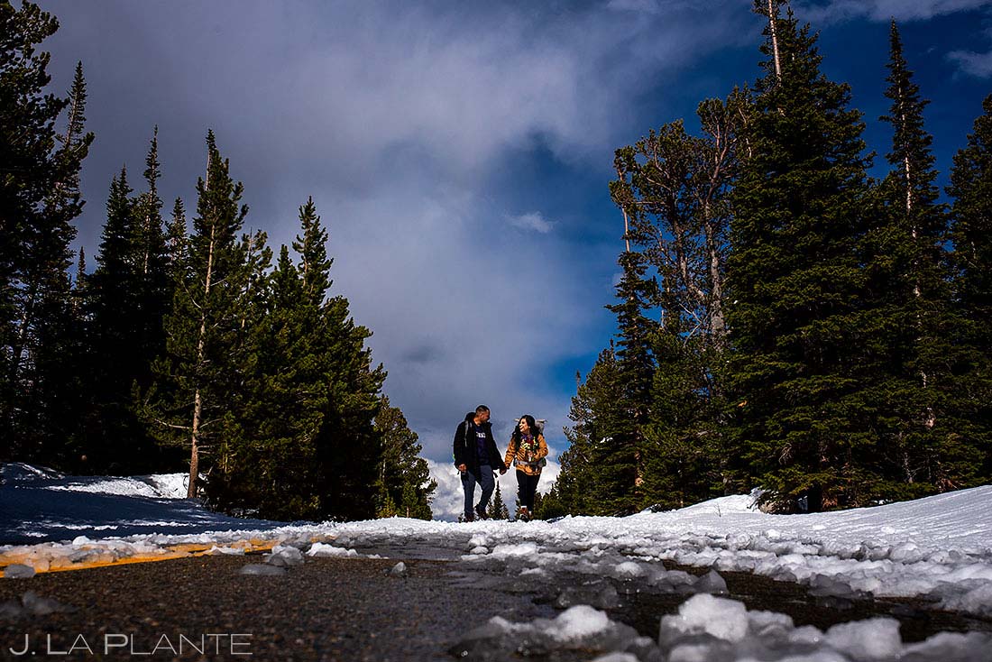 bride and groom hiking to elope at Brainard Lake Colorado