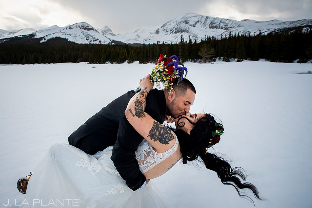 bride and groom first kiss during Brainard Lake elopement