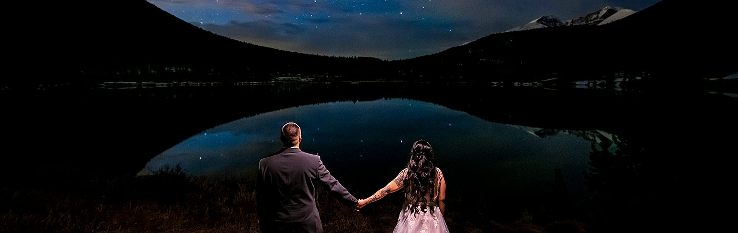 bride and groom under the stars during Brainard Lake elopement