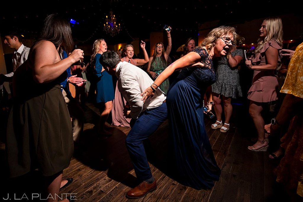 wedding guests dancing during reception party