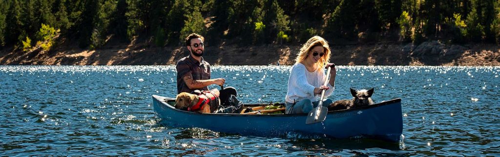 canoeing engagement session with dogs in Boulder Colorado