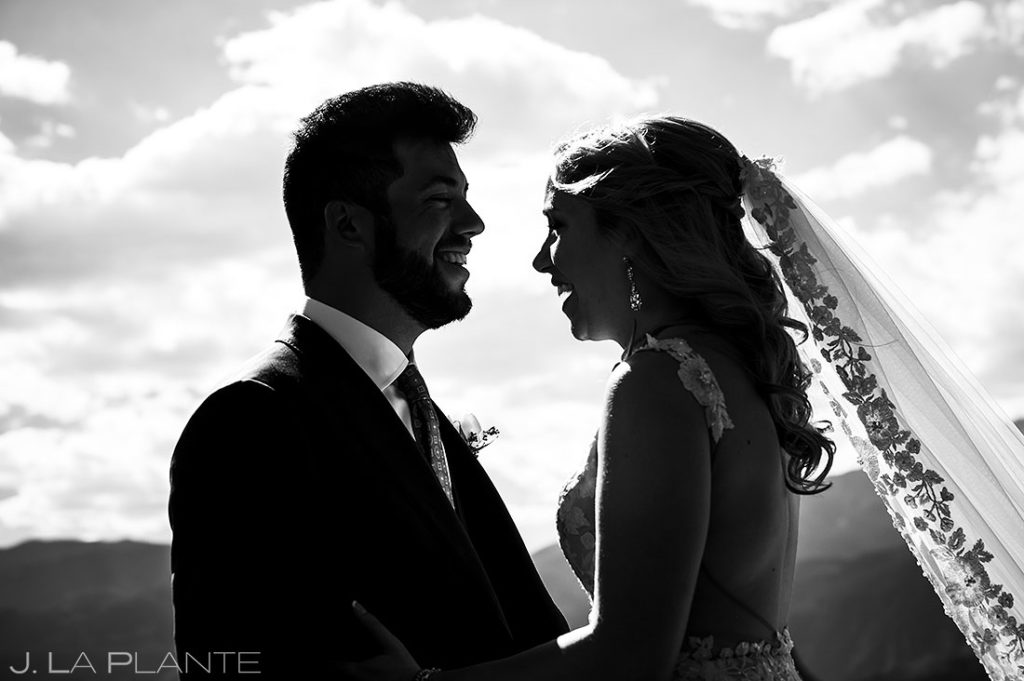 black and white silhouette photo of bride and groom