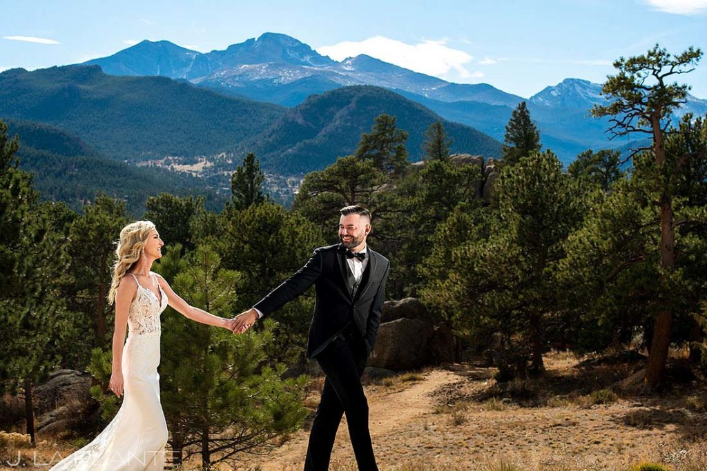 portrait of bride and groom with Longs Peak