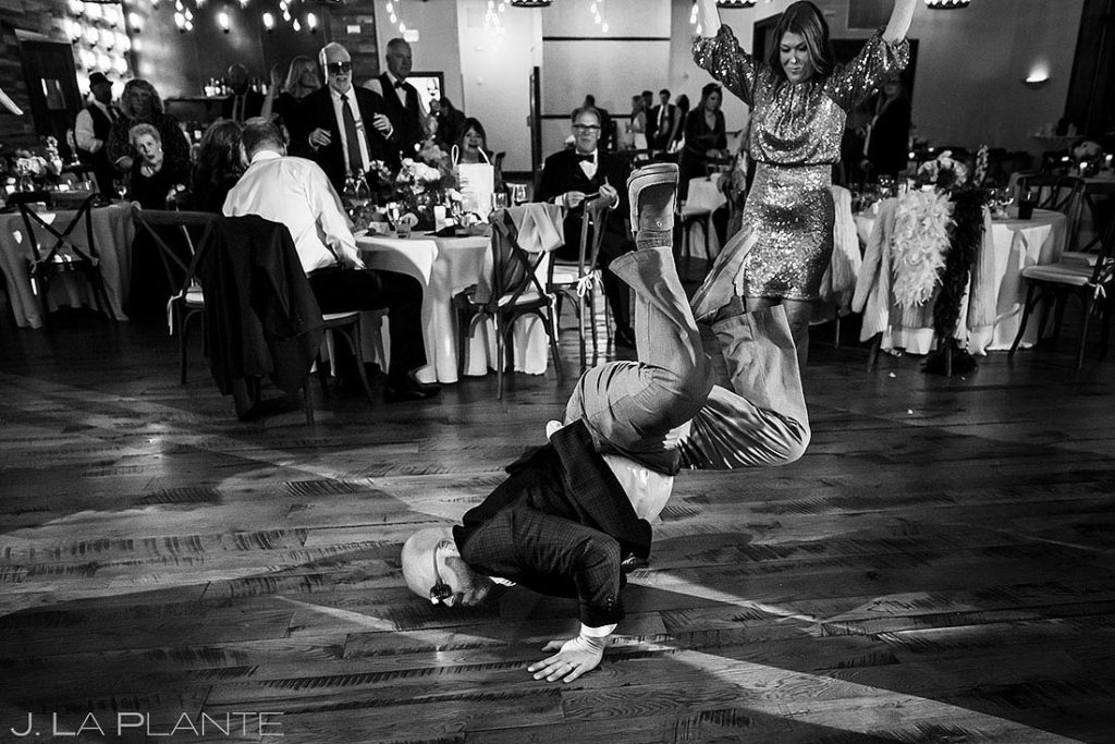 wedding guest break dancing during reception