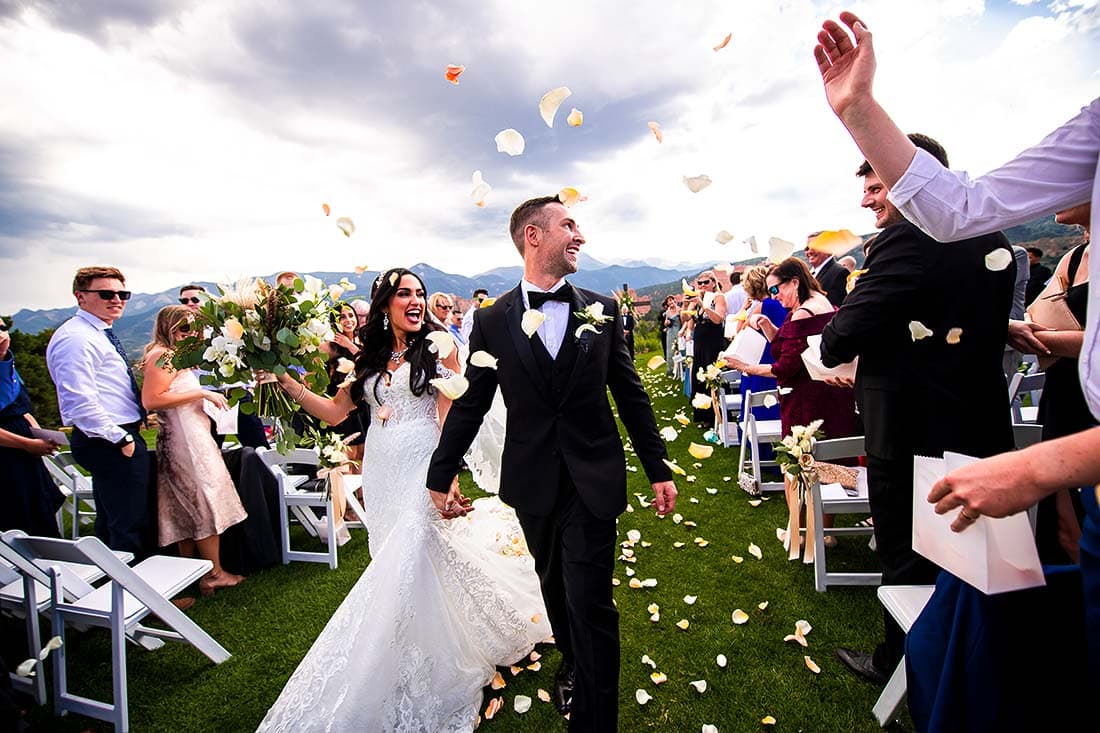vibrant wedding photography bride and groom ceremony send off