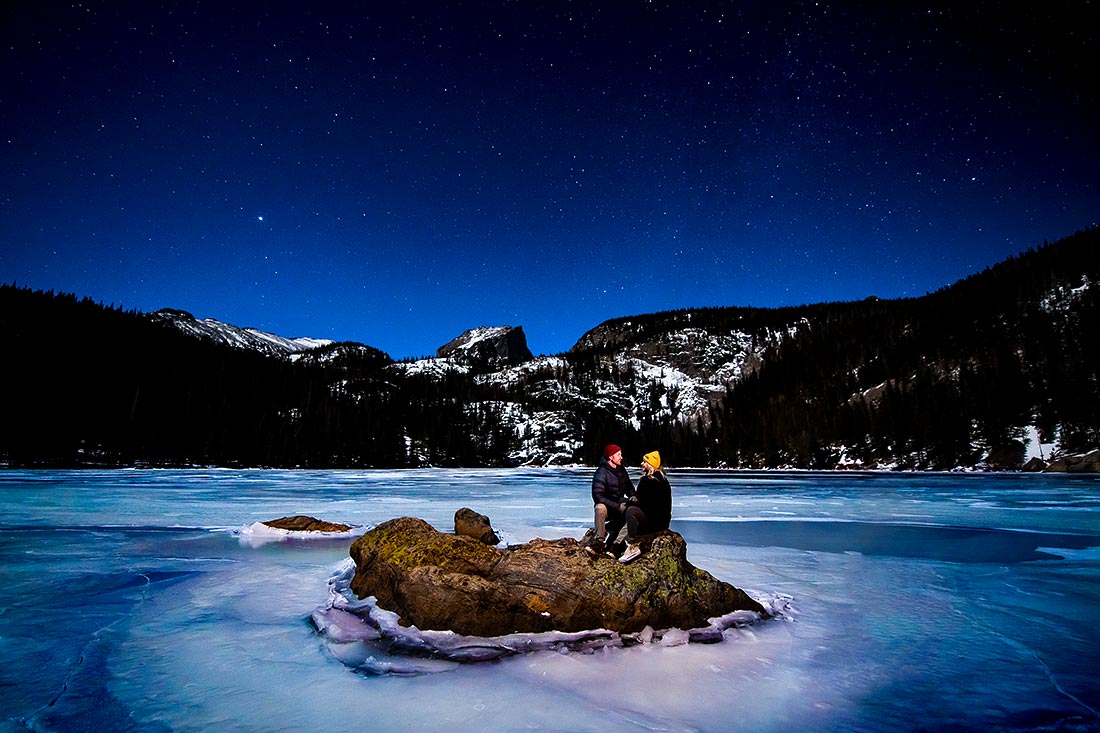 vibrant wedding photography bride and groom on frozen mountain lake