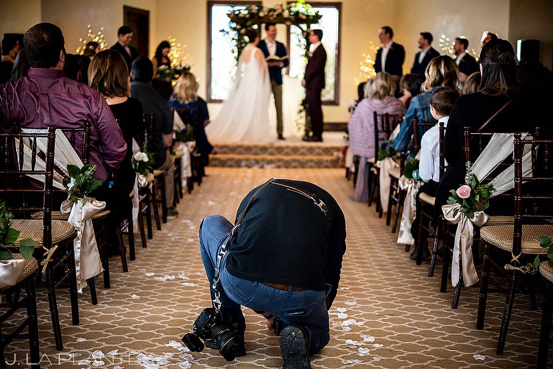 wedding photography behind the scenes photographer at ceremony