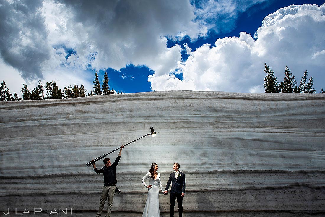 wedding photographer lighting couple's photos in Estes Park Colorado