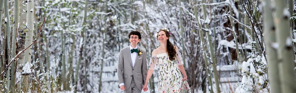 bride and groom portrait at snowy winter wedding