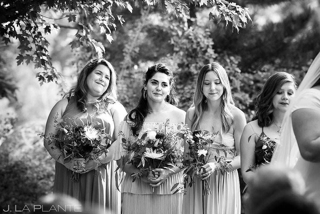 bridesmaids listening to vows at wedding ceremony