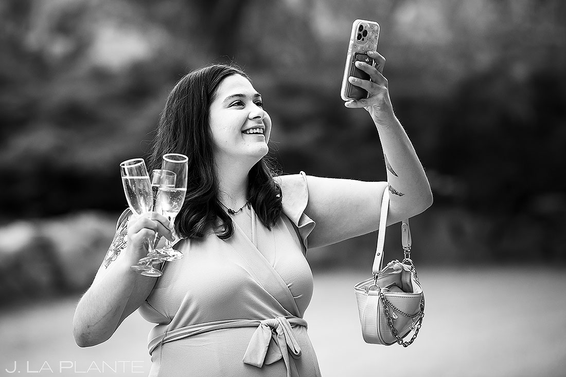 wedding guests taking selfies during cocktail hour