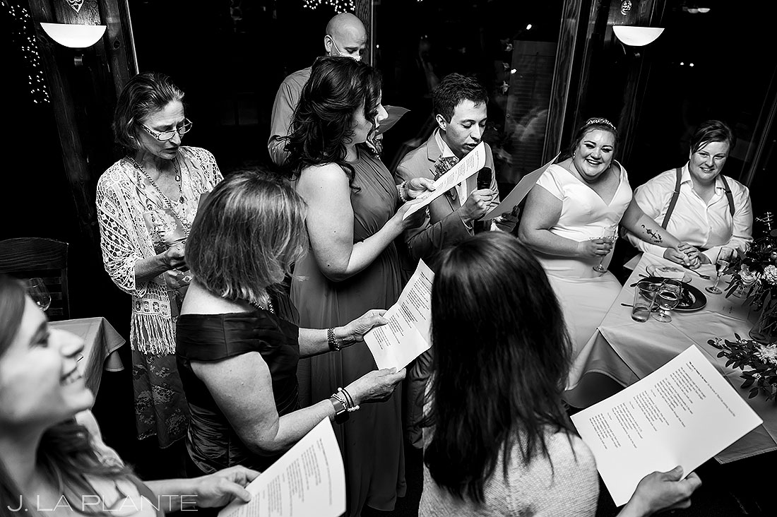 wedding guests singing during reception
