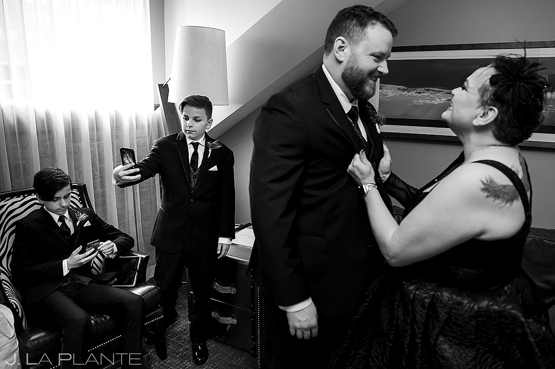 bride and groom getting ready for Denver vow renewal