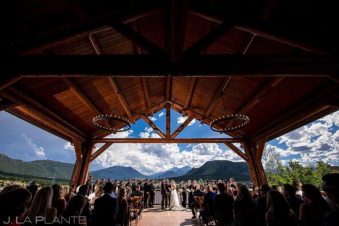 outdoor mountain ceremony at summer wedding at Estes Park Resort