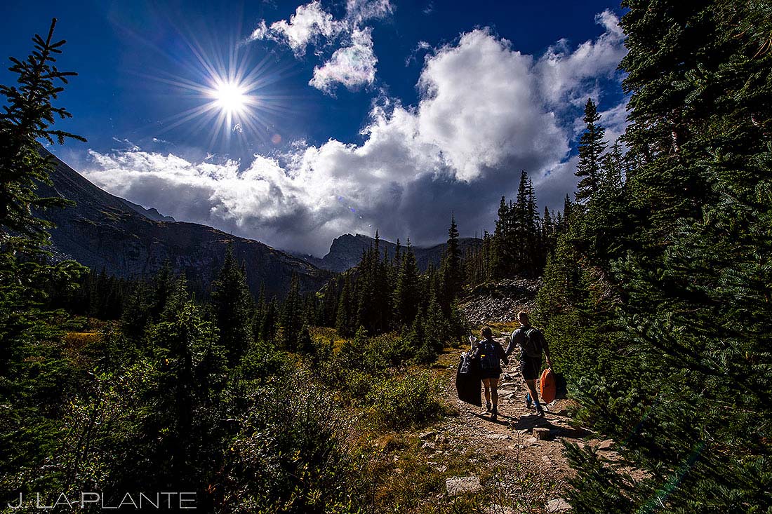 bride and groom hiking for Colorado adventure elopement