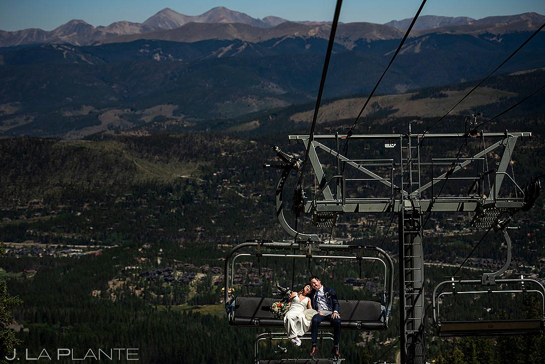 bride and groom riding chairlift to Breckenridge Nordic Center Wedding