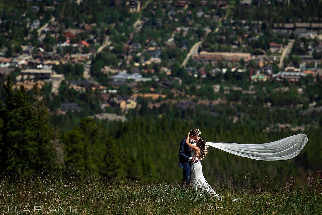 bride and groom on mountain at Breckenridge Nordic Center Wedding