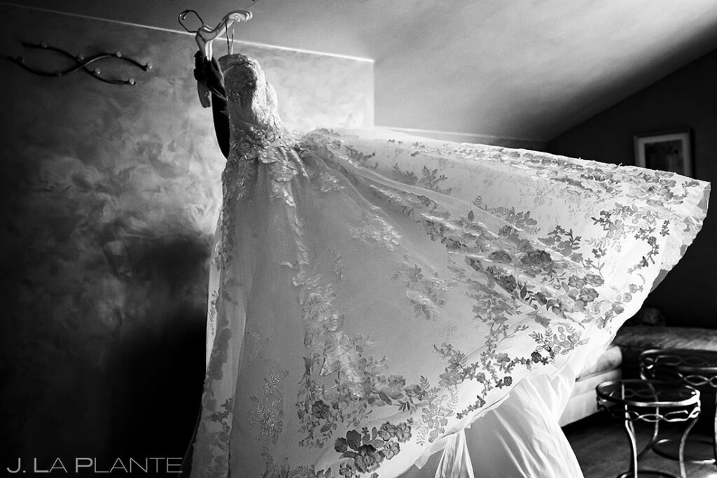 bride getting into wedding dress at Cielo at Castle Pines wedding