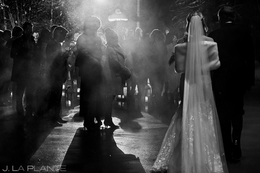 snowy nighttime ceremony at Donovan Pavilion wedding