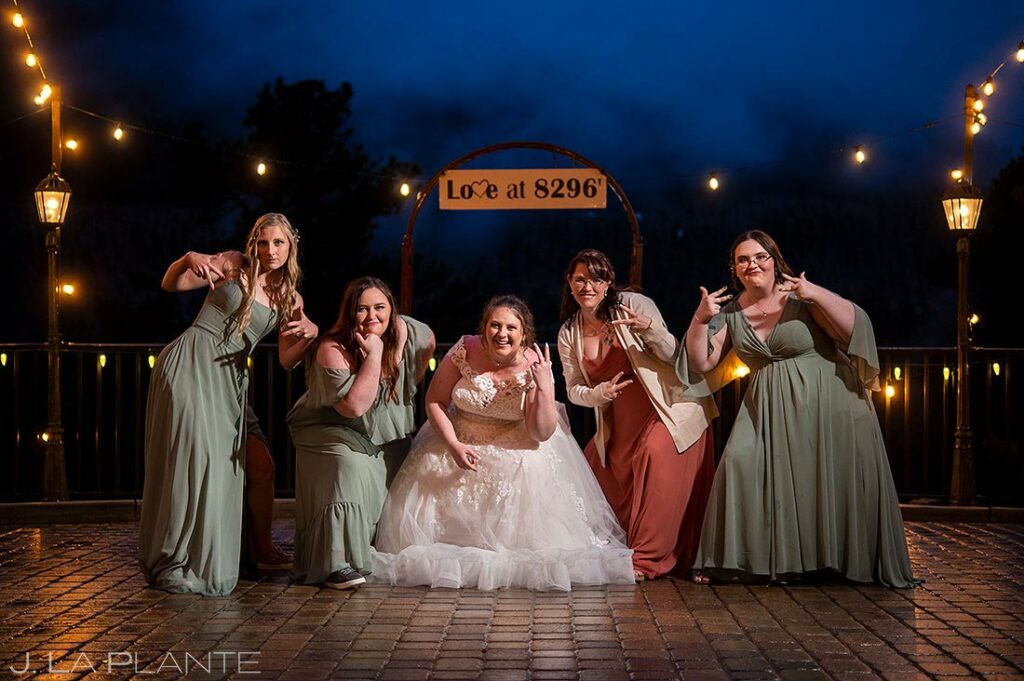 blue hour portrait of the bridesmaids in the rain