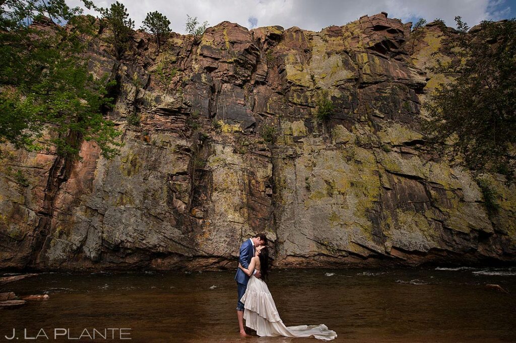 bride and groom to-be in mountain river