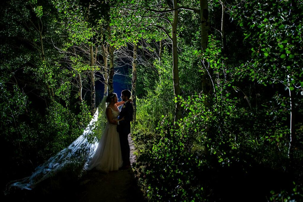 nighttime portrait of bride and groom