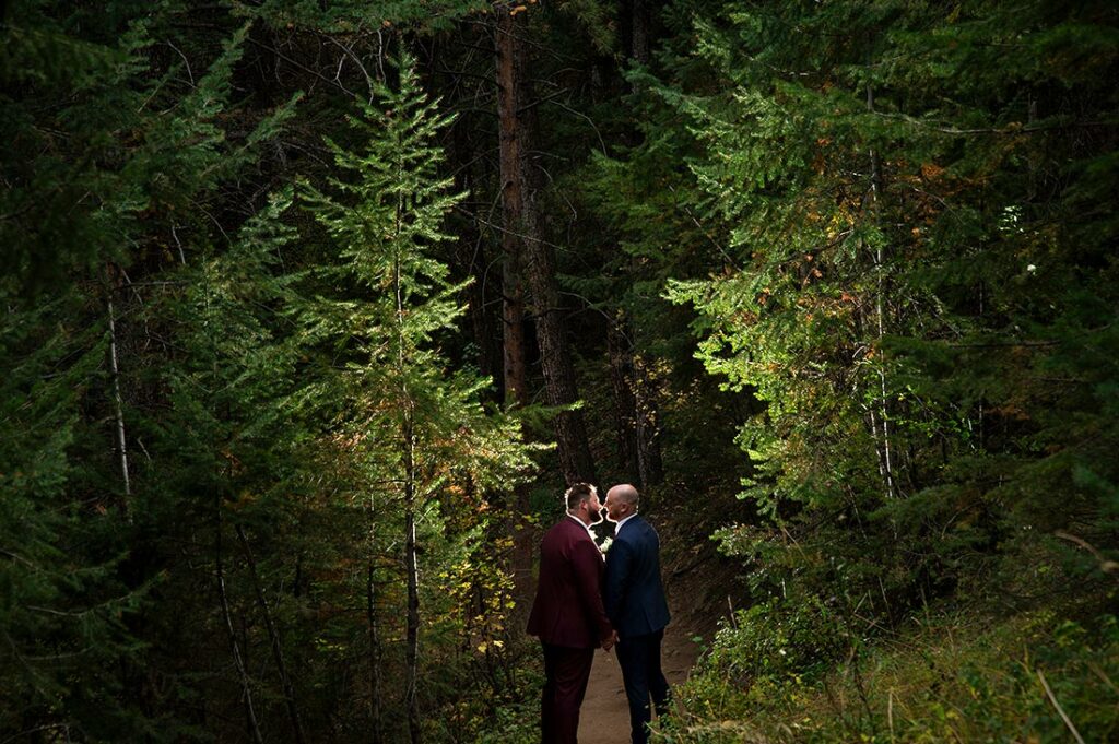 portrait of groom and groom in the forest
