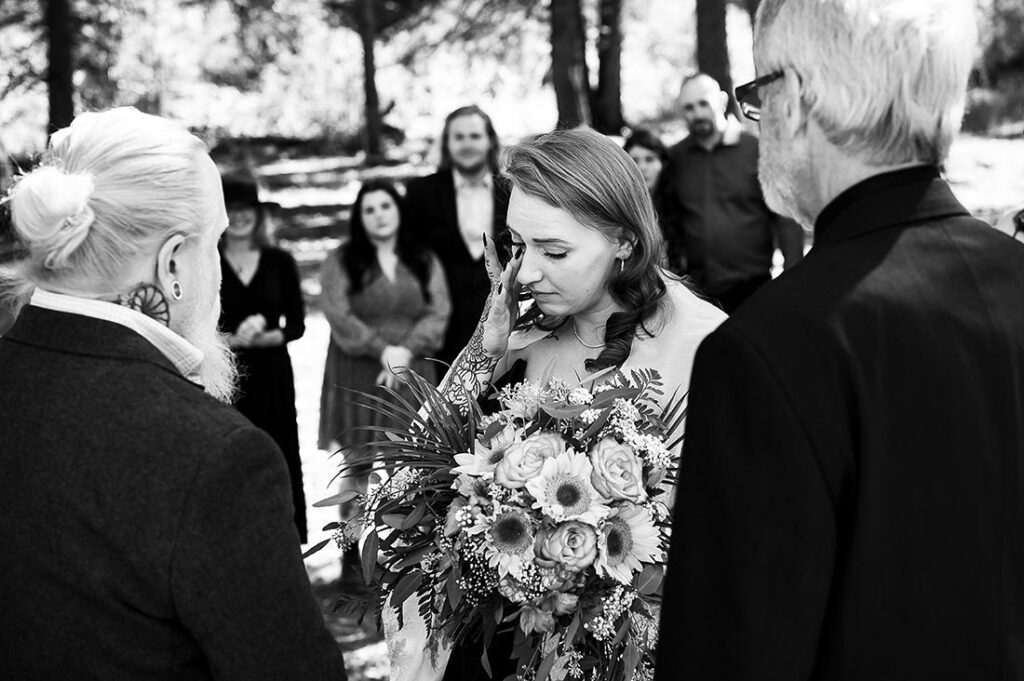 bride crying during Telluride elopement ceremony