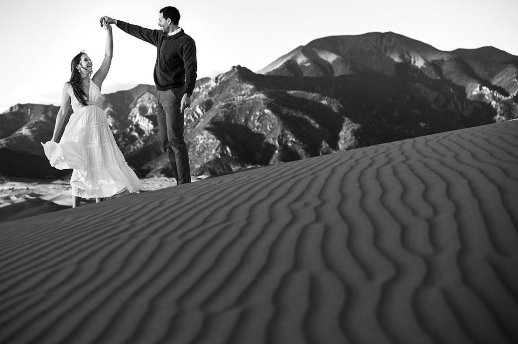 bride and groom dancing at Great Sand Dunes National Park