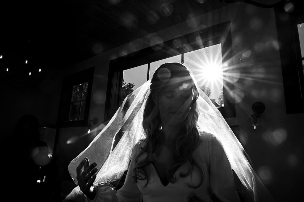 black and white silhouette of bride at winter wedding at The Boulders
