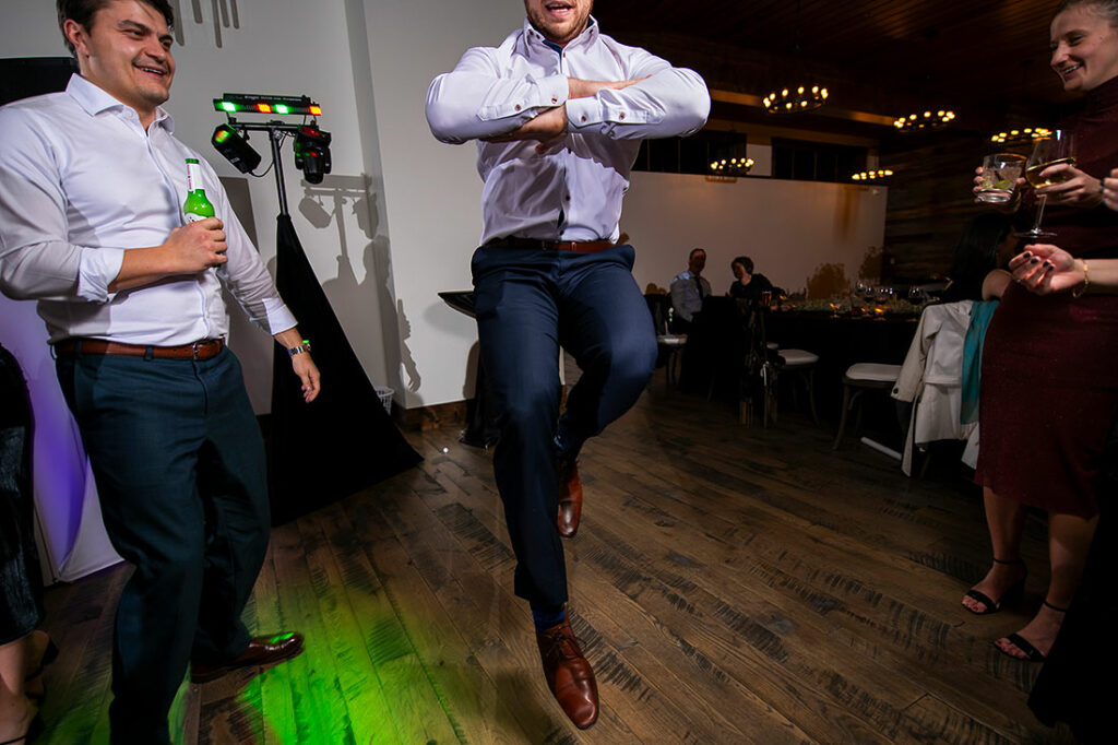 wedding guest river dancing during reception