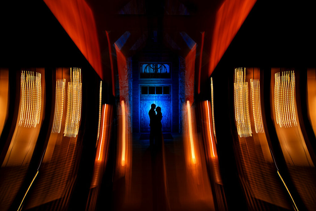 avant garde nighttime portrait of bride and groom