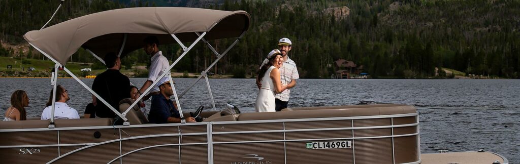 unique wedding welcome dinner ideas bride and groom on a pontoon boat