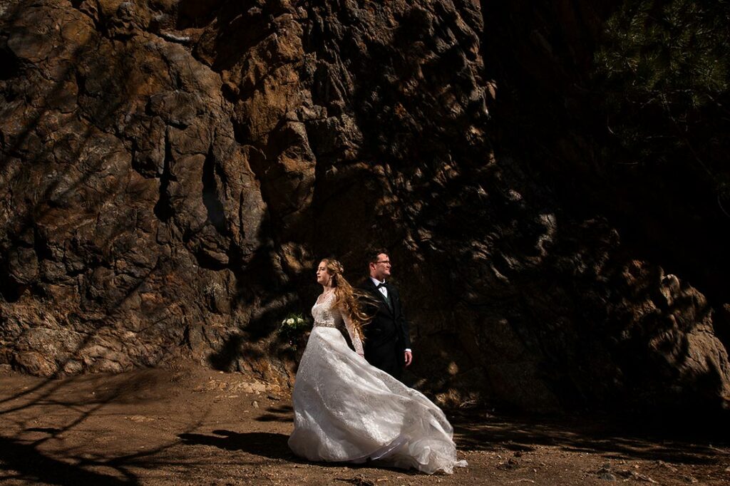 SkyView wedding at Fall River Village bride and groom at rock wall